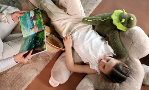 DOUDOU - obciążeniowy pluszowy dinozaur Podcoll Histoire d'Ours, 50 cm, ciemny zielony