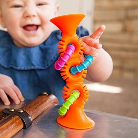 Fat Brain Toy Bobo Przyssawki Grzechotka Pomarańczowa. PipSquigz Loops.
